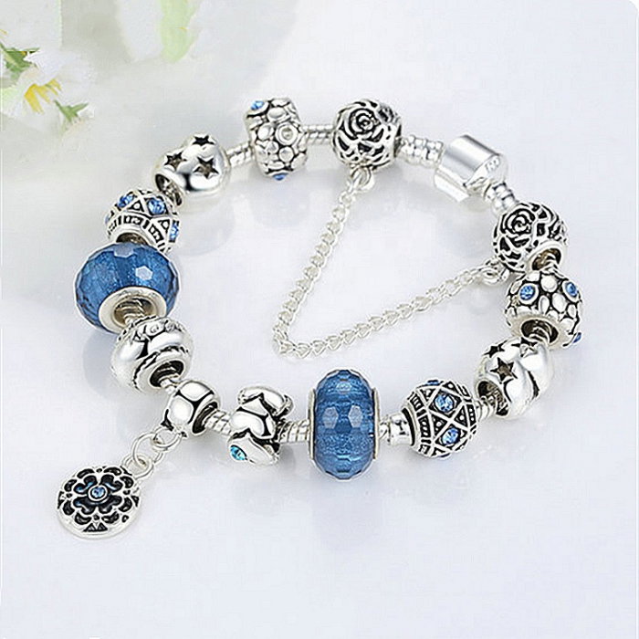 Bratara fantezie placata cu argint, cu talismane albastre [4]