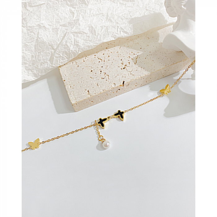 Bratara glezna inox cu fluturi si perla [12]