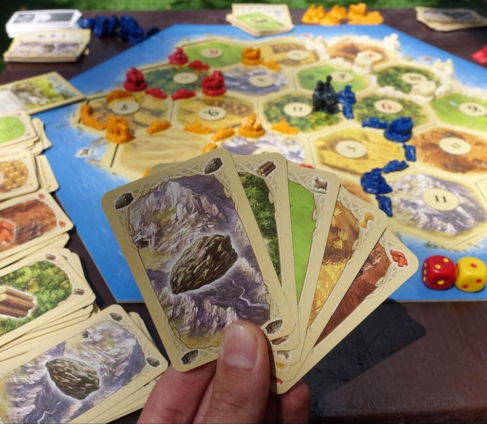 Jocul de societate Catan are cele mai multe versiuni și extensii