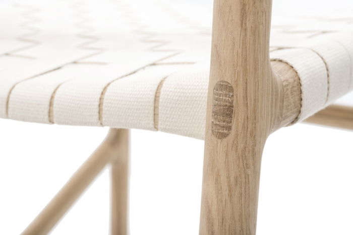 Fawn chair with solid oak structure and cotton webbing seat [17]