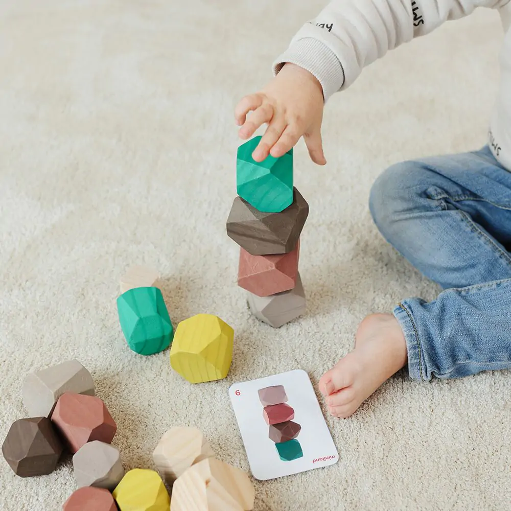 Joc Educativ Pentru Dezvoltarea Motricitatii Wood Stones Miniland 18 luni + [3]
