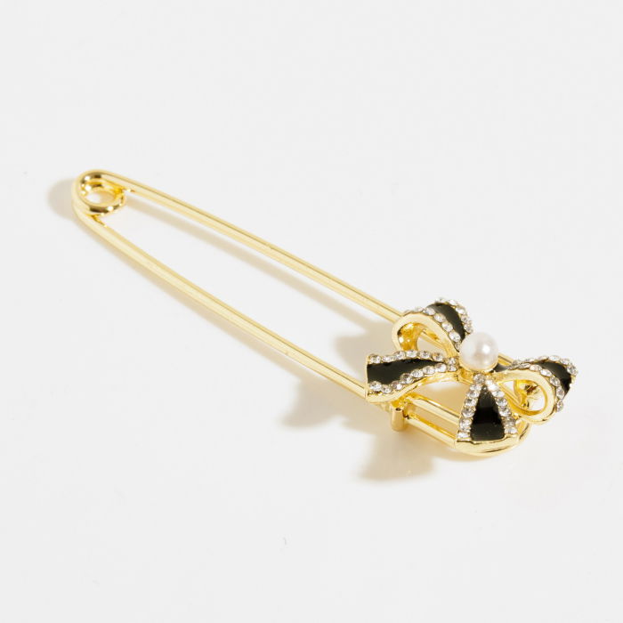 Brosa metalica aurie tip ac cu fundita si pietricele fine albe [2]