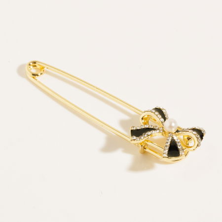 Broșe - Brosa metalica aurie tip ac cu fundita si pietricele fine albe