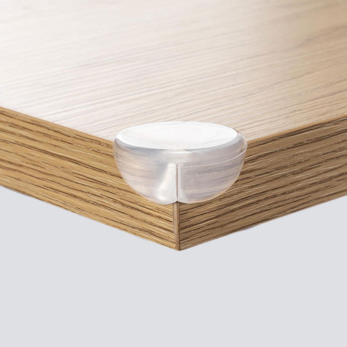 Set 4 protectii universale pentru colturi, din plastic transparent, cu banda adeziva, rezistente la muscaturi, fara PVC, Reer 82049 [1]