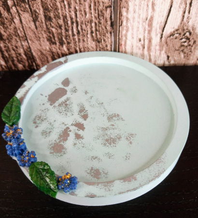 Suport rotund din ceramica decorat cu floricele. [2]