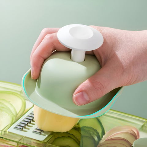 Feliator multifunctional, 6 in 1, pentru fructe si legume, 9 piese, maner, lame de inox, recipient stocare, protectie mana, abs, 35x12x9.4 cm, verde [1]