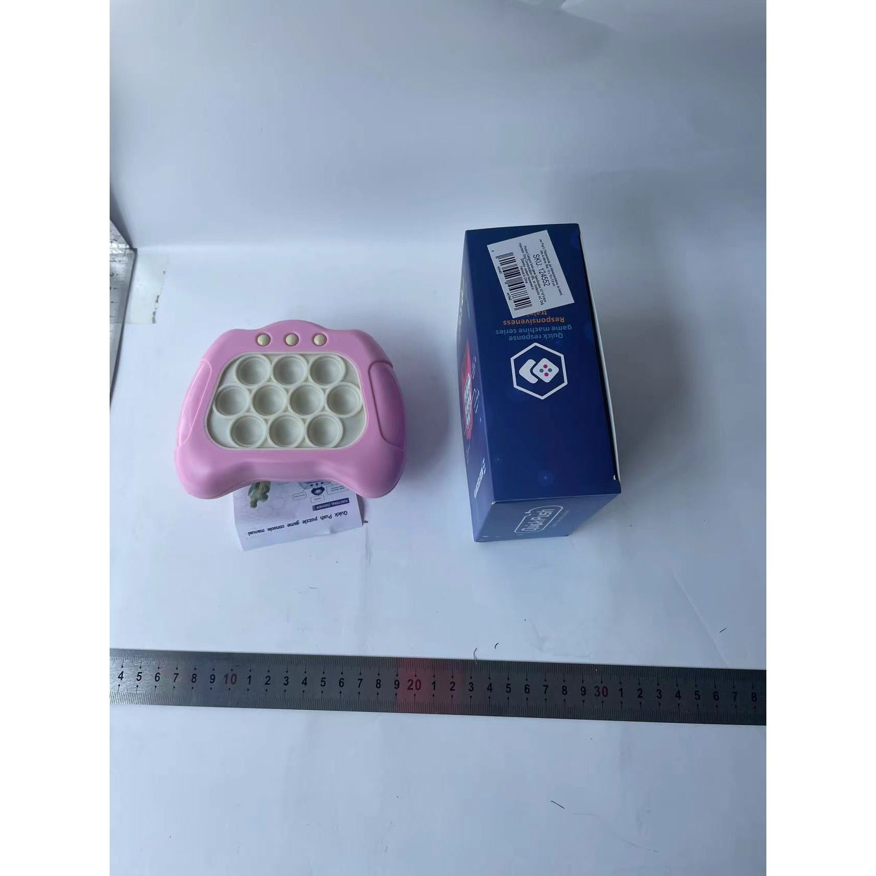 Joc Pop It, Flippy, consola, joc interactiv, antistres, cu baterii, Abs si silicon, Roz, 12 x 10 x 5.8 cm [8]