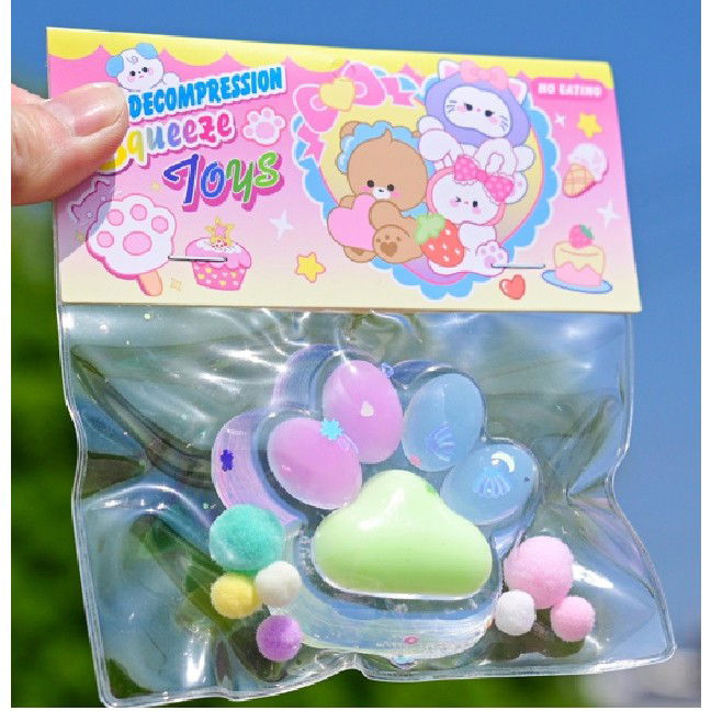 Jucarii Squishy si Gonggi - Jucarie Antistres Squishy, Flippy, cu Revenire Lenta, Labuta de Pisica Pufoasa, 7.5 cm, Ambalaj Transparent, Model 27055, Multicolor