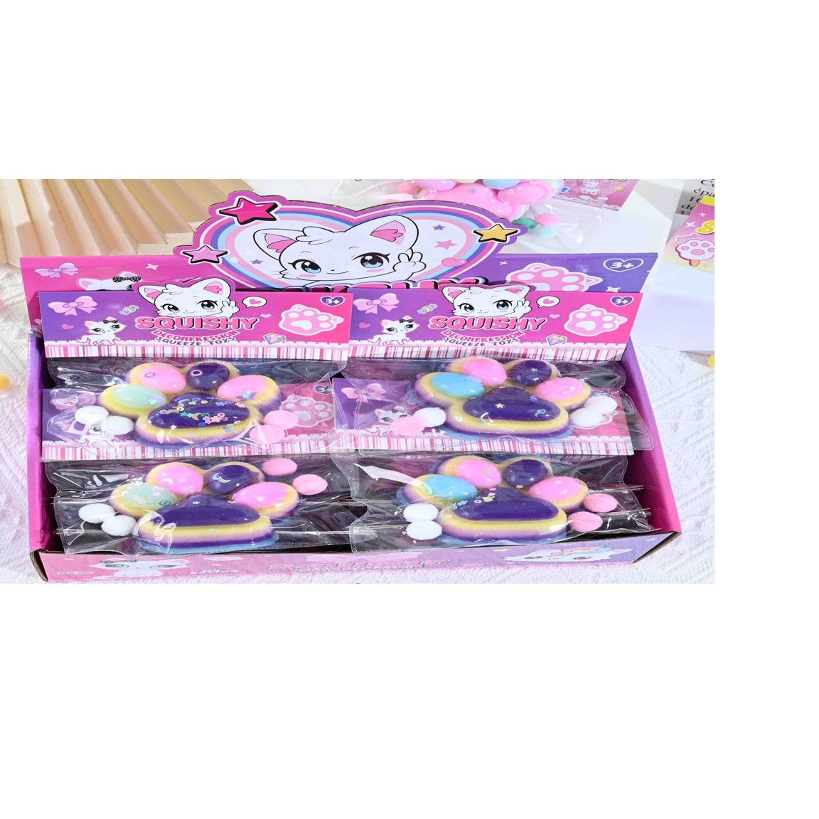 Jucarii Squishy si Gonggi - Jucarie Antistres Squishy, Flippy, cu Revenire Lenta, Labuta de Pisica Pufoasa, 7.5 cm, Ambalaj Transparent, Model 27051, Multicolor