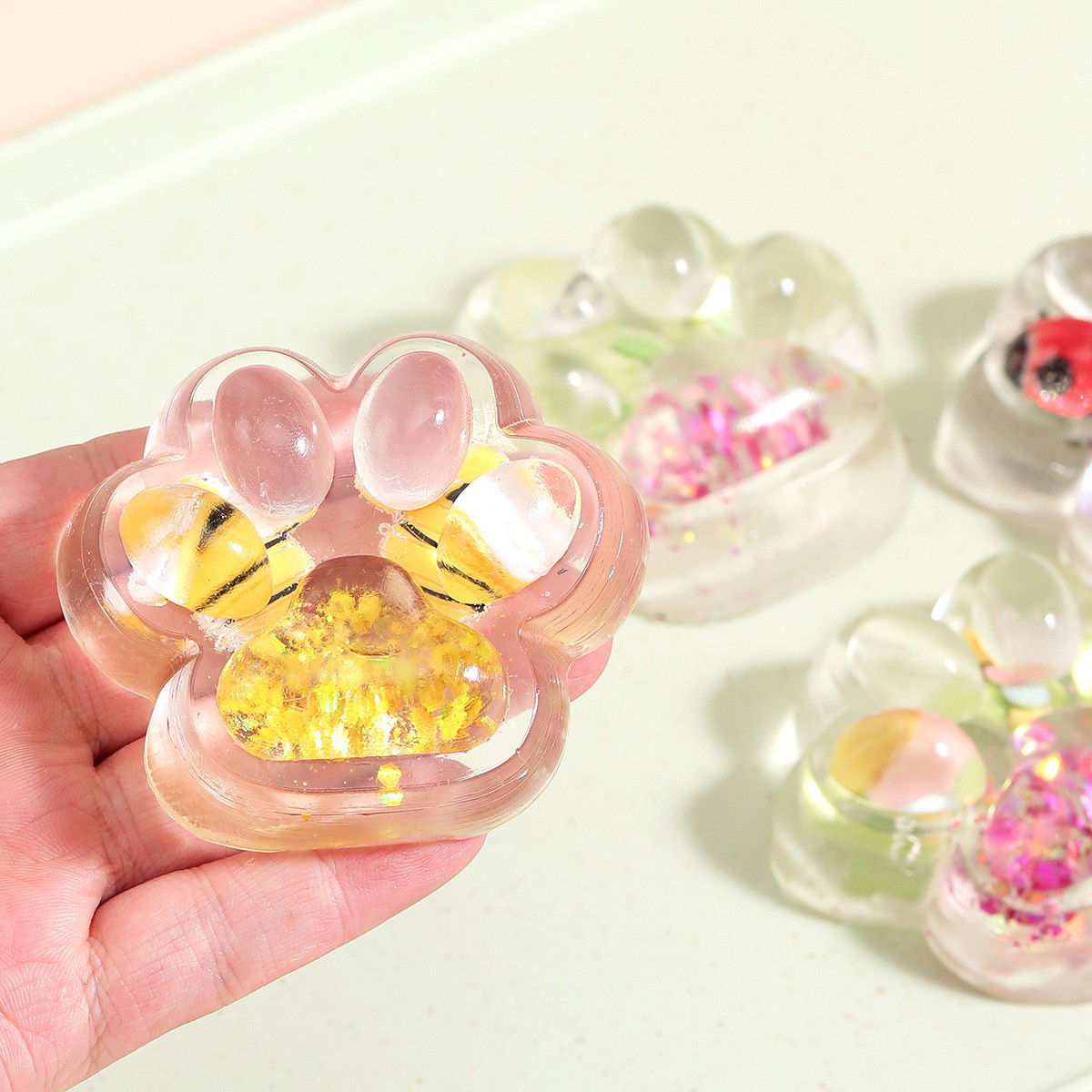 Jucarie Antistres Squishy, Flippy, cu Revenire Lenta, Squeeze Pinch Family, Model Cat Paw, 6.5 x 7 cm, din Tpr, 4-6 Ani, Model 7 Insecte, Transparent [9]