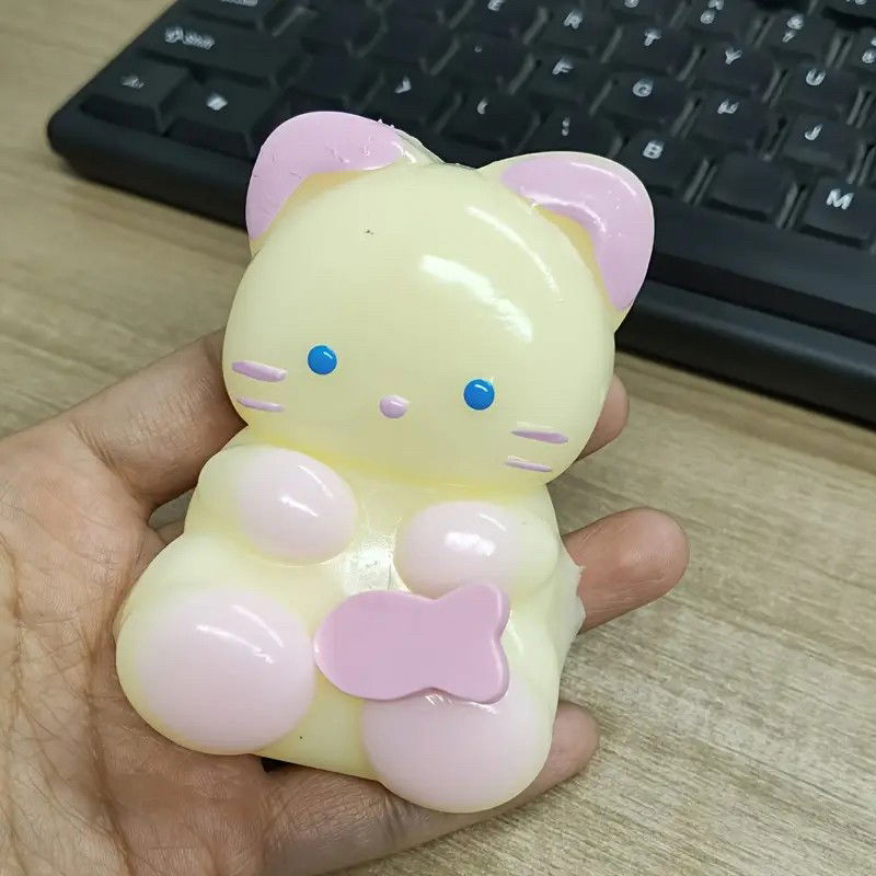 Jucarii Squishy si Gonggi - Jucarie Antistres Squishy, Flippy, cu Revenire Lenta, Model Pisicuta, Squeeze Pinch Family, 9 x 5.5 cm, Galben