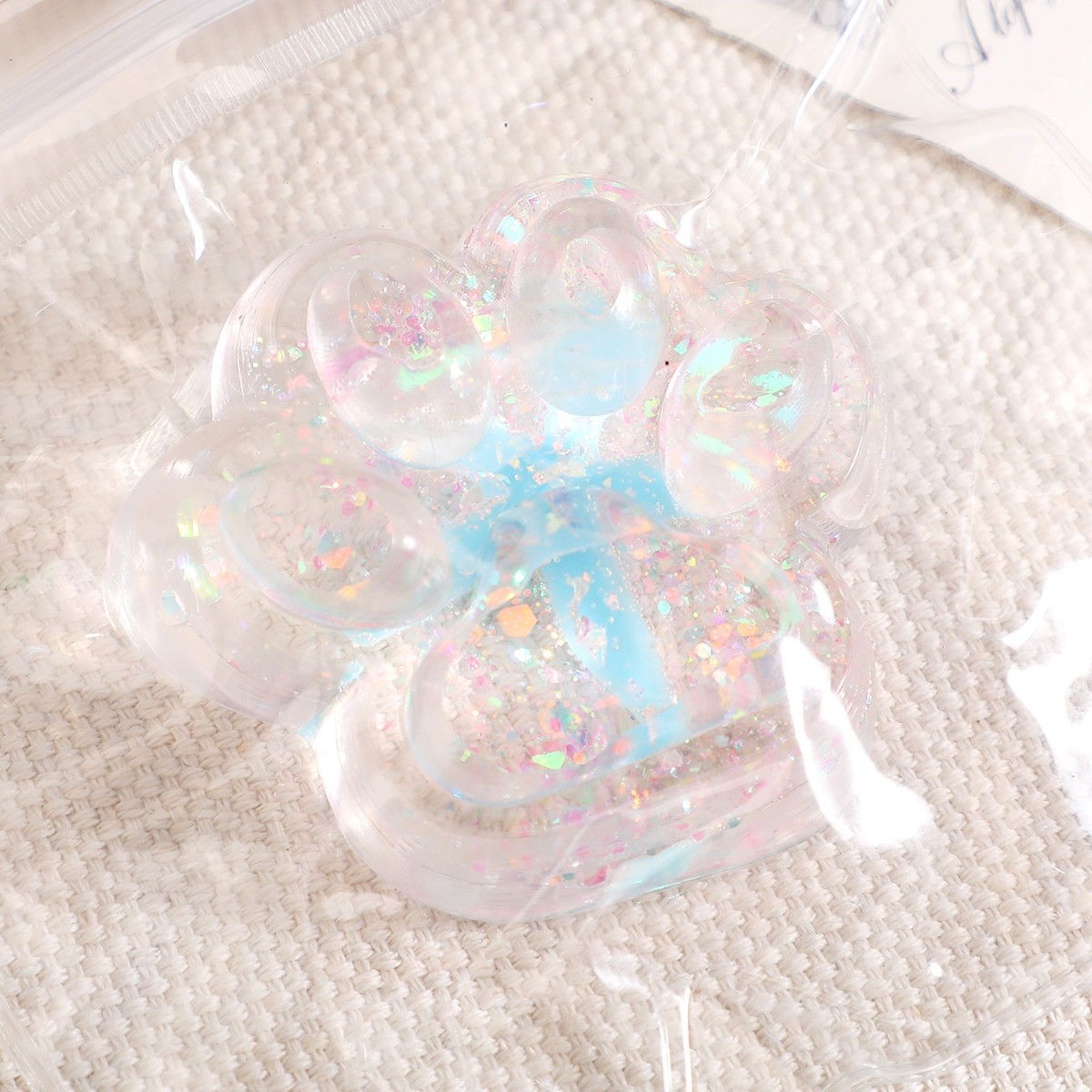 Jucarie Antistres Squishy, Flippy, cu Revenire Lenta, Squeeze Pinch Family, Model Cat Paw, 6.5 x 7 cm, din Tpr, 4-6 Ani, Model 2 Flori, Transparent [2]