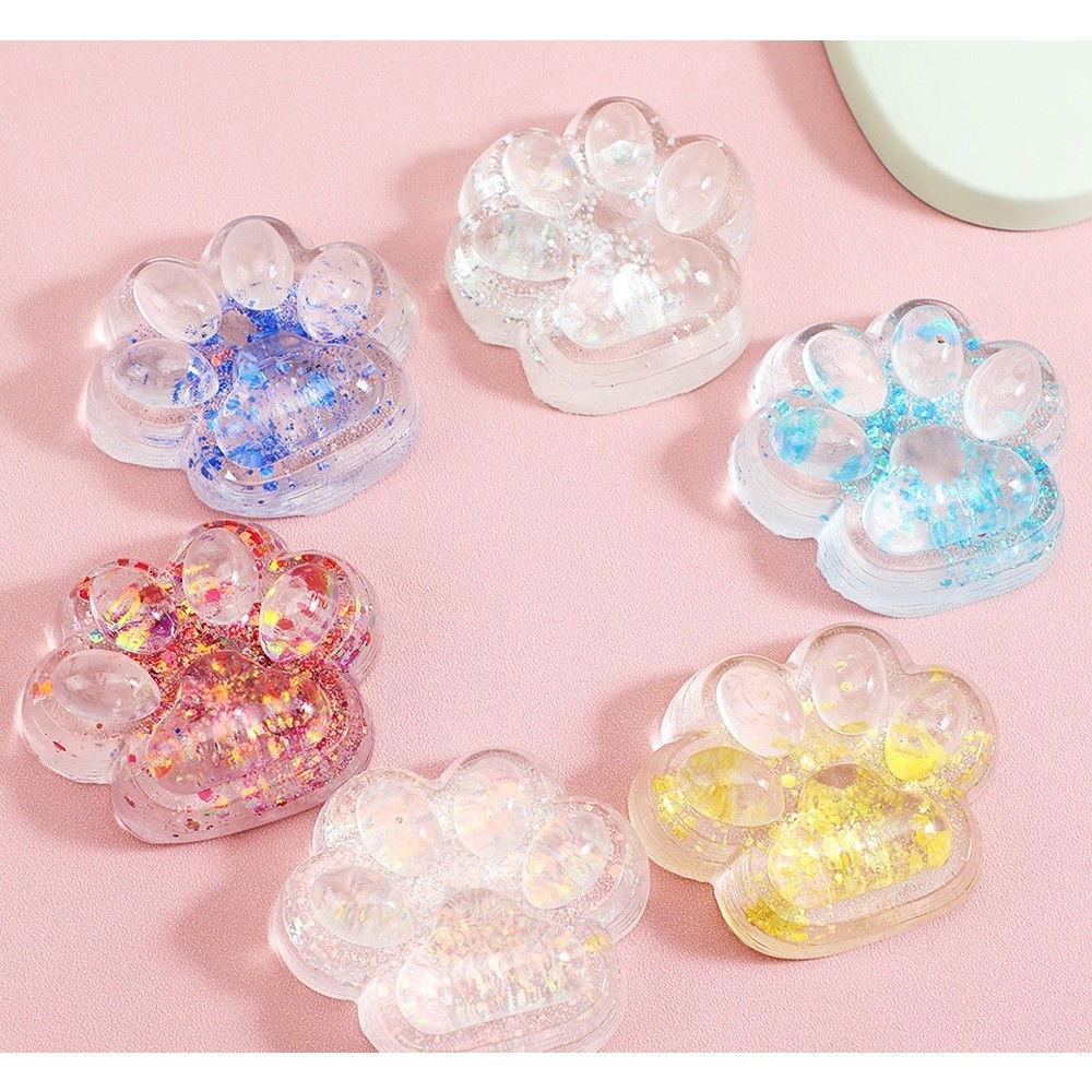 Jucarie Antistres Squishy, Flippy, cu Revenire Lenta, Squeeze Pinch Family, Model Cat Paw, 6.5 x 7 cm, din Tpr, 4-6 Ani, Model 4 Sclipici, Transparent [1]