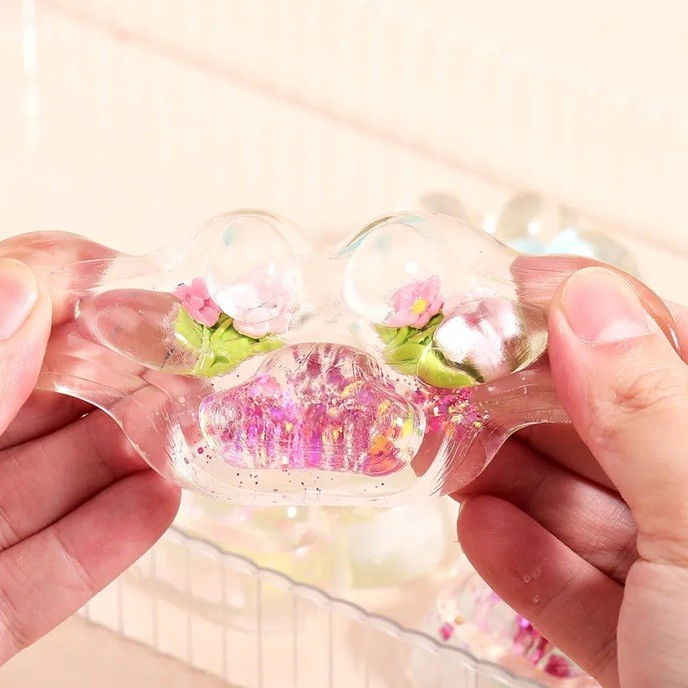 Jucarie Antistres Squishy, Flippy, Labuta de Pisica Pufoasa, cu Revenire Lenta, 7 x 6.5 cm, Model Flori 1, Transparent [8]