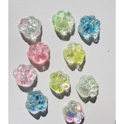 10 - 25 LEI - Jucarie Antistres Squishy, Flippy, cu Revenire Lenta, Squeeze Pinch Family, Model Cat Paw, 6.5 x 7 cm, din Tpr, 4-6 Ani, Model 4 Sclipici, Transparent